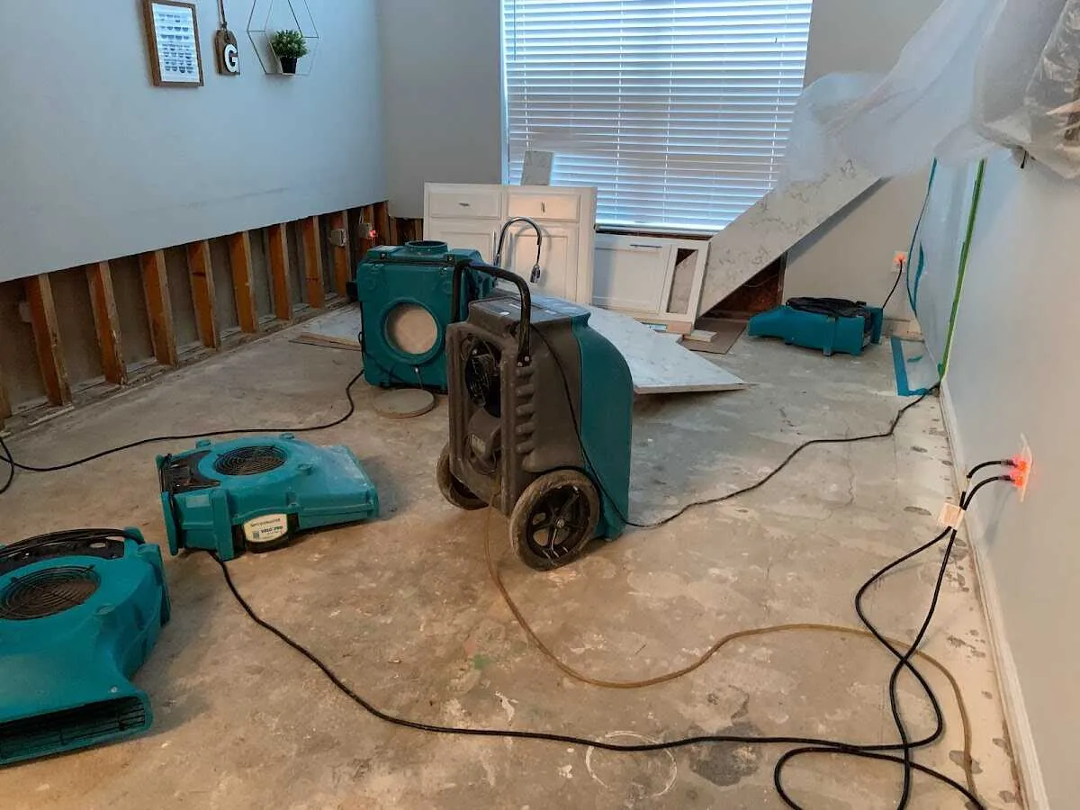 Dehumidifier in flood-cut room for Water Damage Restoration in Wildwood