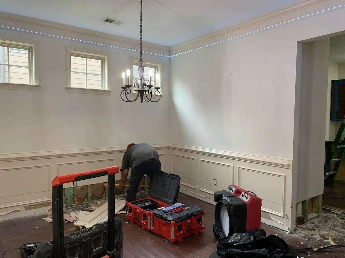 Restoration technician with professional equipment in Wildwood